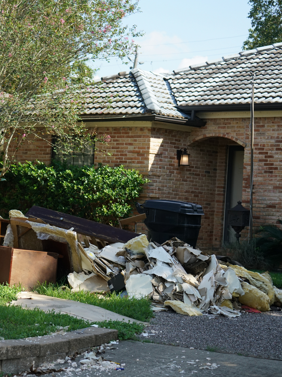 n this image, you can see a house in Texas that has been severely damaged by a strong storm. Debris and garbage are scattered around the exterior, indicating the impact of the destructive weather. If you find yourself in a similar situation, Beacon Restoration is here to help.