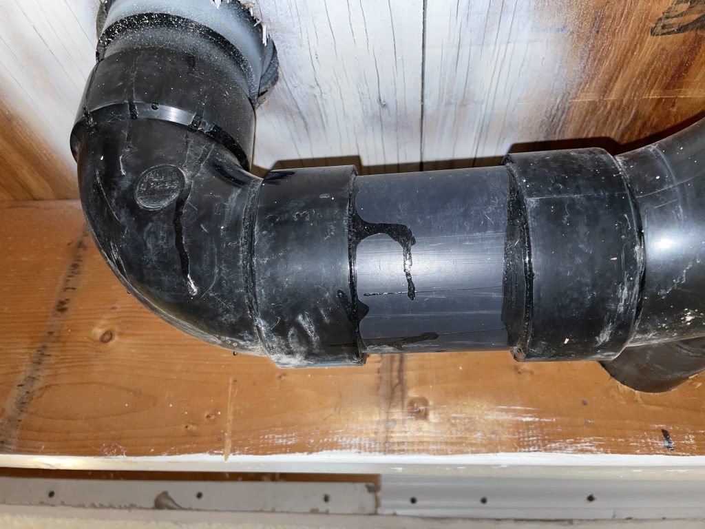 A drainage in need of professional assessment by Beacon Restoration Restoration for a dripping faucet issue.